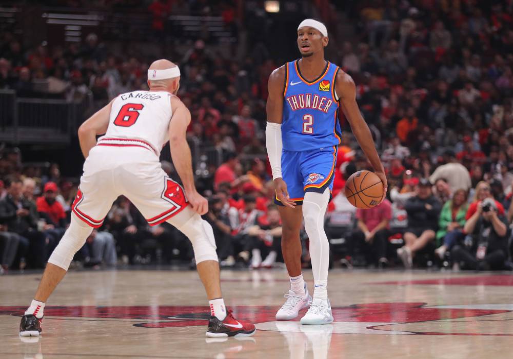 Jogadores do Thunder durante partida da NBA