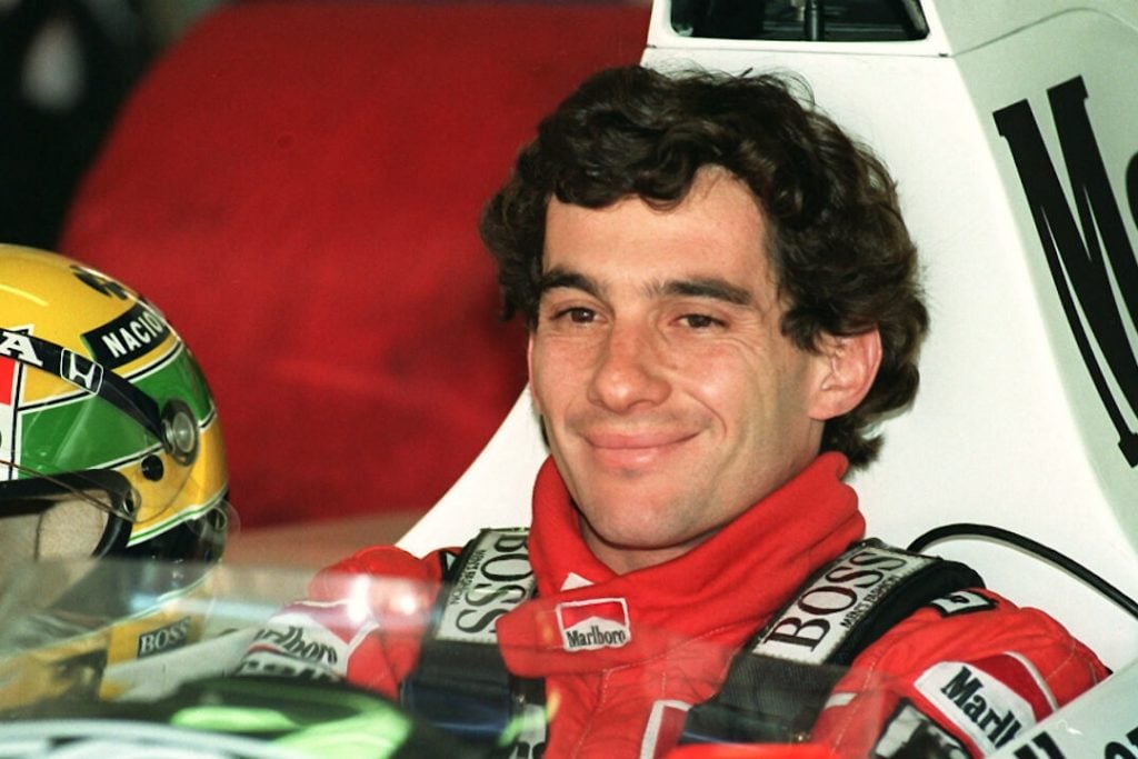 The best Formula One driver ever, Ayrton Senna grinning ear to ear in the cockpit of his McLaren